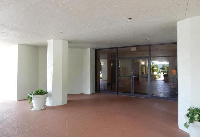 6463 La Costa Drive, Unit 404 Boca Raton, FL 33433 - Photo 3 of 17 Carport - Building Entrance