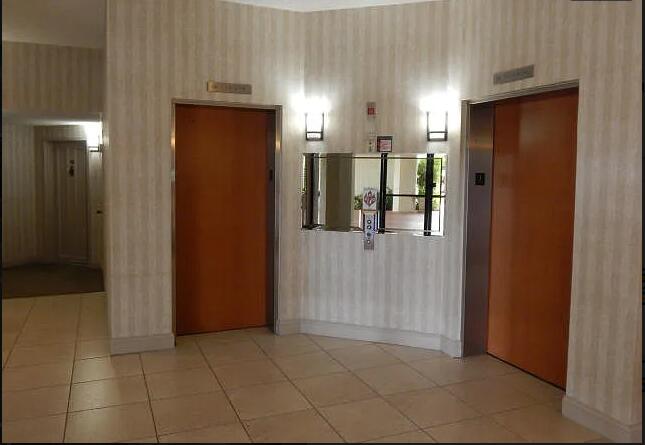 6463 La Costa Drive, Unit 404 Boca Raton, FL 33433 - Photo 4 of 17 Elevators Lobby