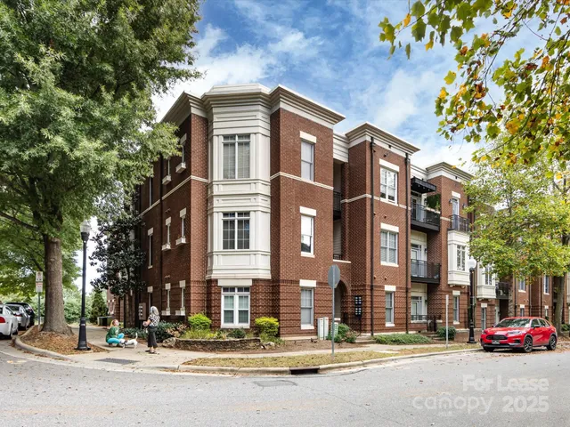 a front view of a building with street view