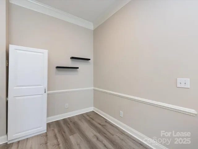 a view of an empty walk in closet