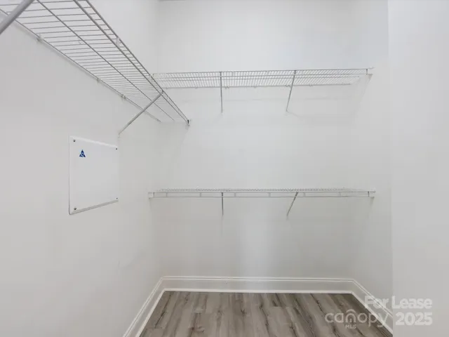 a view of a room with racks on the wall