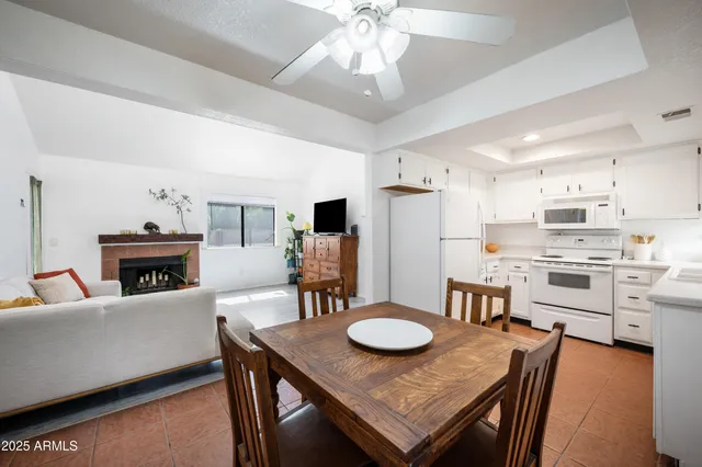 a view of kitchen and dining area with furniture