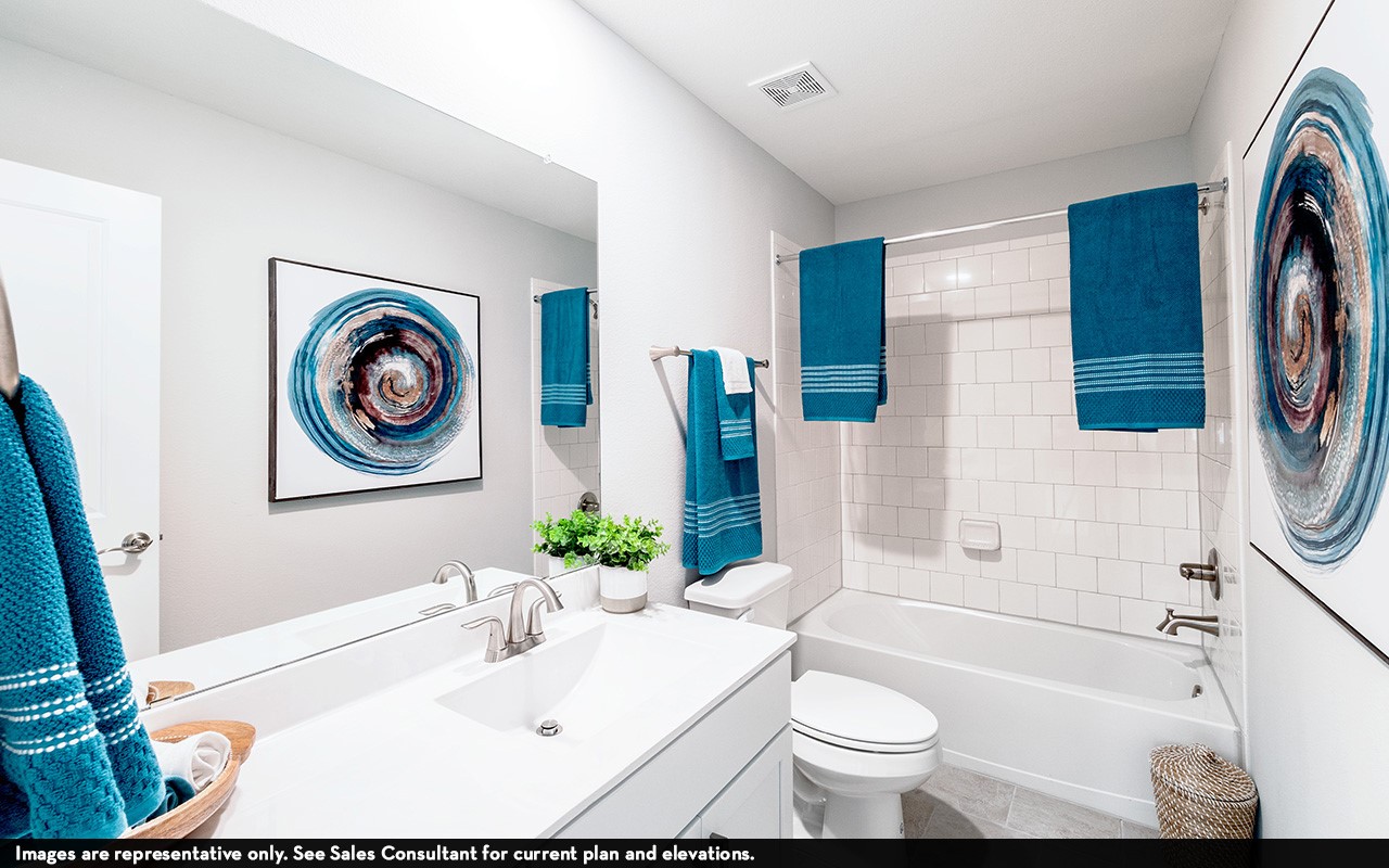 1722 Navigation Lane Angleton, TX 77515 - Photo 18 of 21 a bathroom with a sink a toilet and a bathtub