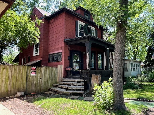 3651 West 64th Place Chicago, IL 60629 - Photo 4 of 35 a front view of a house with garden