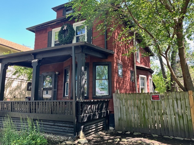3651 West 64th Place Chicago, IL 60629 - Photo 5 of 35 a view of a house with a tree in front of it