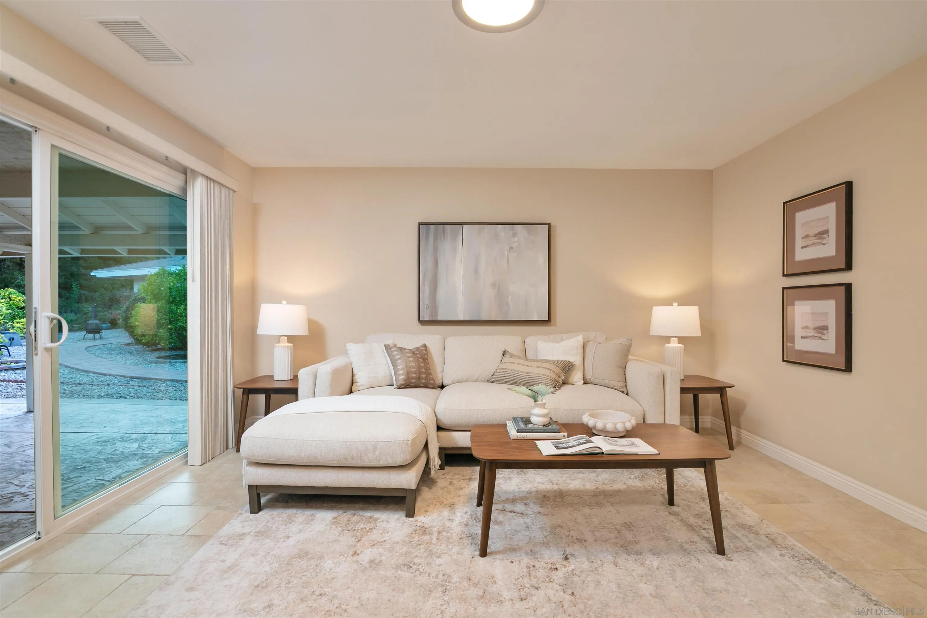 12607 Opimo Drive San Diego, CA 92128 - Photo 21 of 48 a living room with furniture and a yard