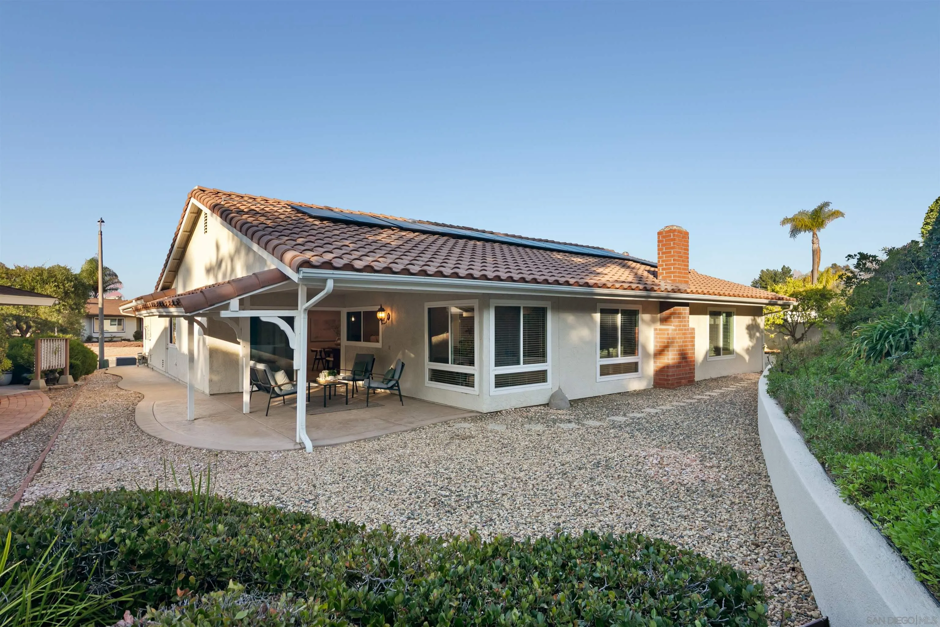 12607 Opimo Drive San Diego, CA 92128 - Photo 36 of 48 a view of a house with a porch