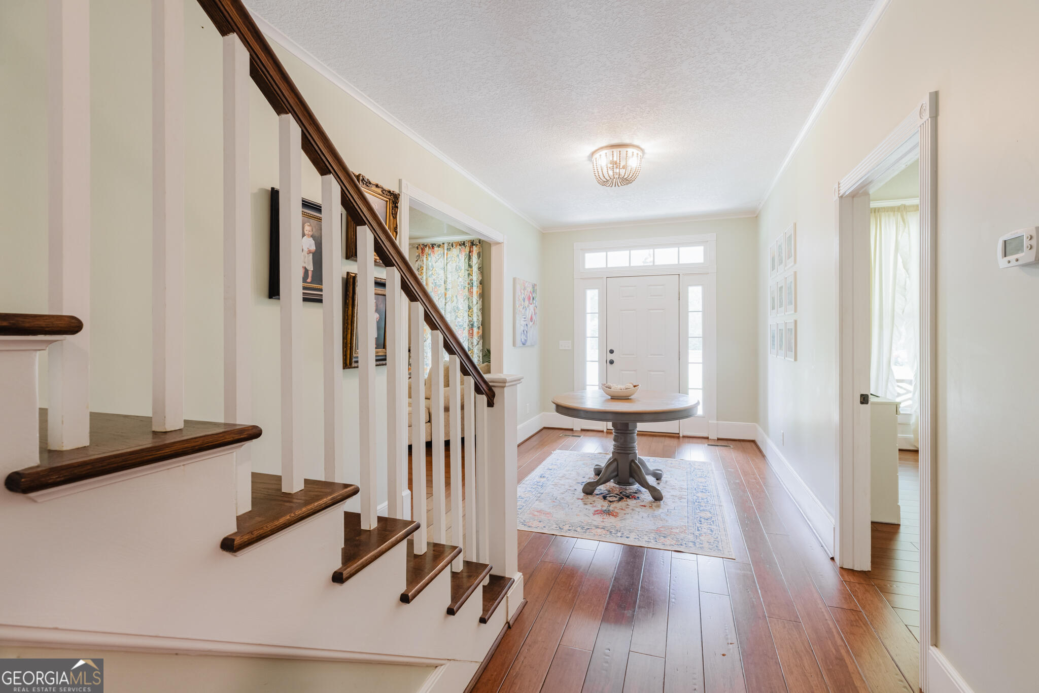1859 Upper River Road Americus, GA 31709 - Photo 19 of 47 a view of entryway with wooden floor and stairs