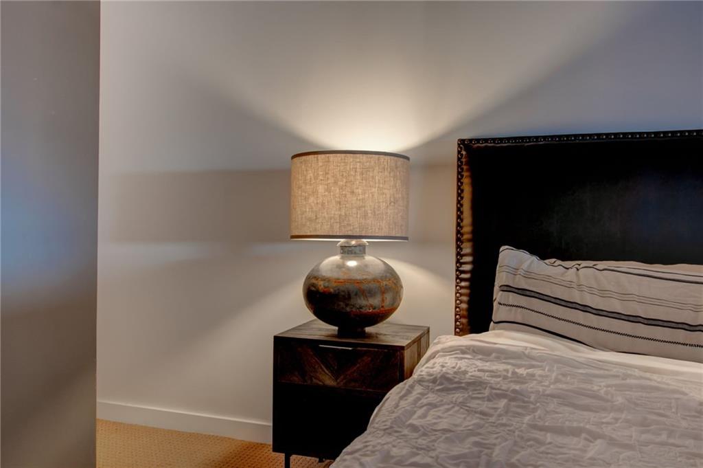 170 Boulevard Southeast, Unit E404 Atlanta, GA 30312 - Photo 16 of 42 a living room with a couch and a potted plant