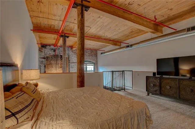 wooden floor with table and chairs in it
