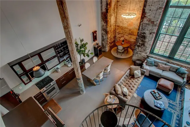 a bedroom with baby bed and window