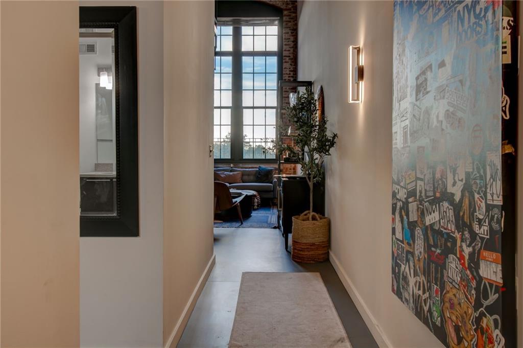 170 Boulevard Southeast, Unit E404 Atlanta, GA 30312 - Photo 2 of 42 a view of hallway with furniture and a window