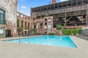170 Boulevard Southeast, Unit E404 Atlanta, GA 30312 - Photo 31 of 42 a view of a swimming pool with a patio
