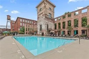 a view of an ocean with a house