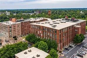 an aerial view of a house with a balcony