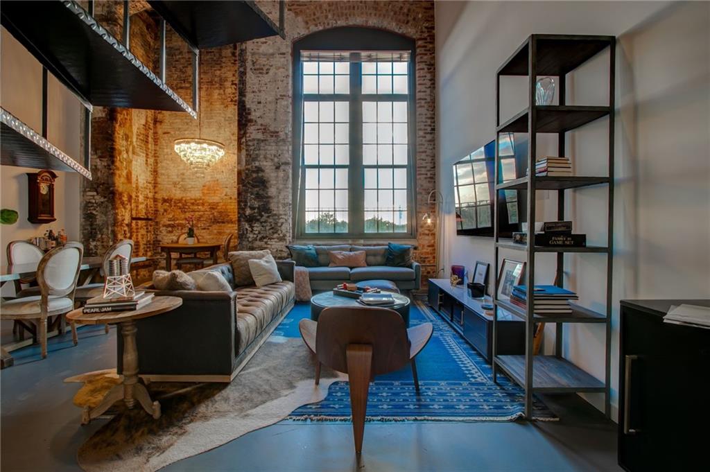 170 Boulevard Southeast, Unit E404 Atlanta, GA 30312 - Photo 4 of 42 a living room with furniture and a window