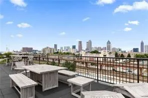 a view of a terrace with sitting area