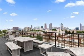 170 Boulevard Southeast, Unit E404 Atlanta, GA 30312 - Photo 41 of 42 a view of a balcony with wooden floor