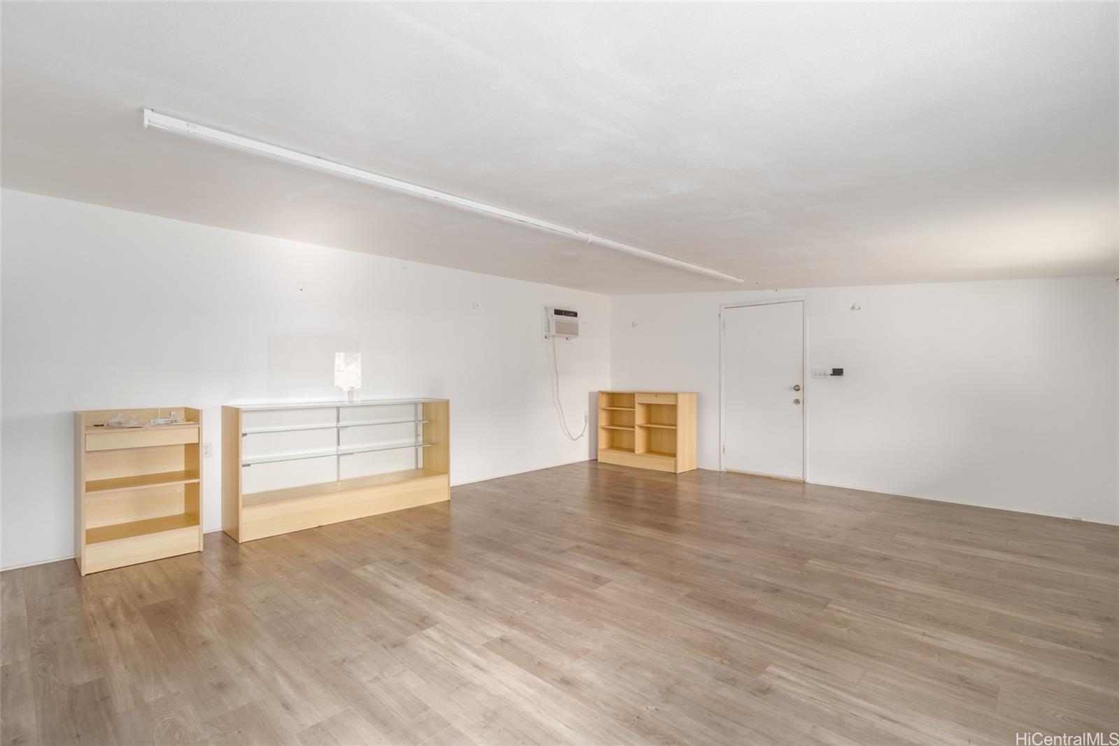 15-2885 Pahoa Village Road Pahoa, HI 96778 - Photo 13 of 25 wooden floor in an empty room
