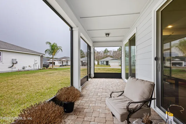 a view of back yard from dining room