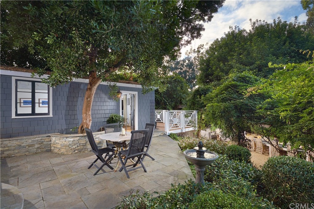 495 Arroyo Chico Laguna Beach, CA 92651 - Photo 24 of 28 a view of a house with backyard and sitting area