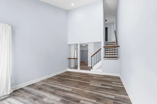 a view of entryway with wooden floor