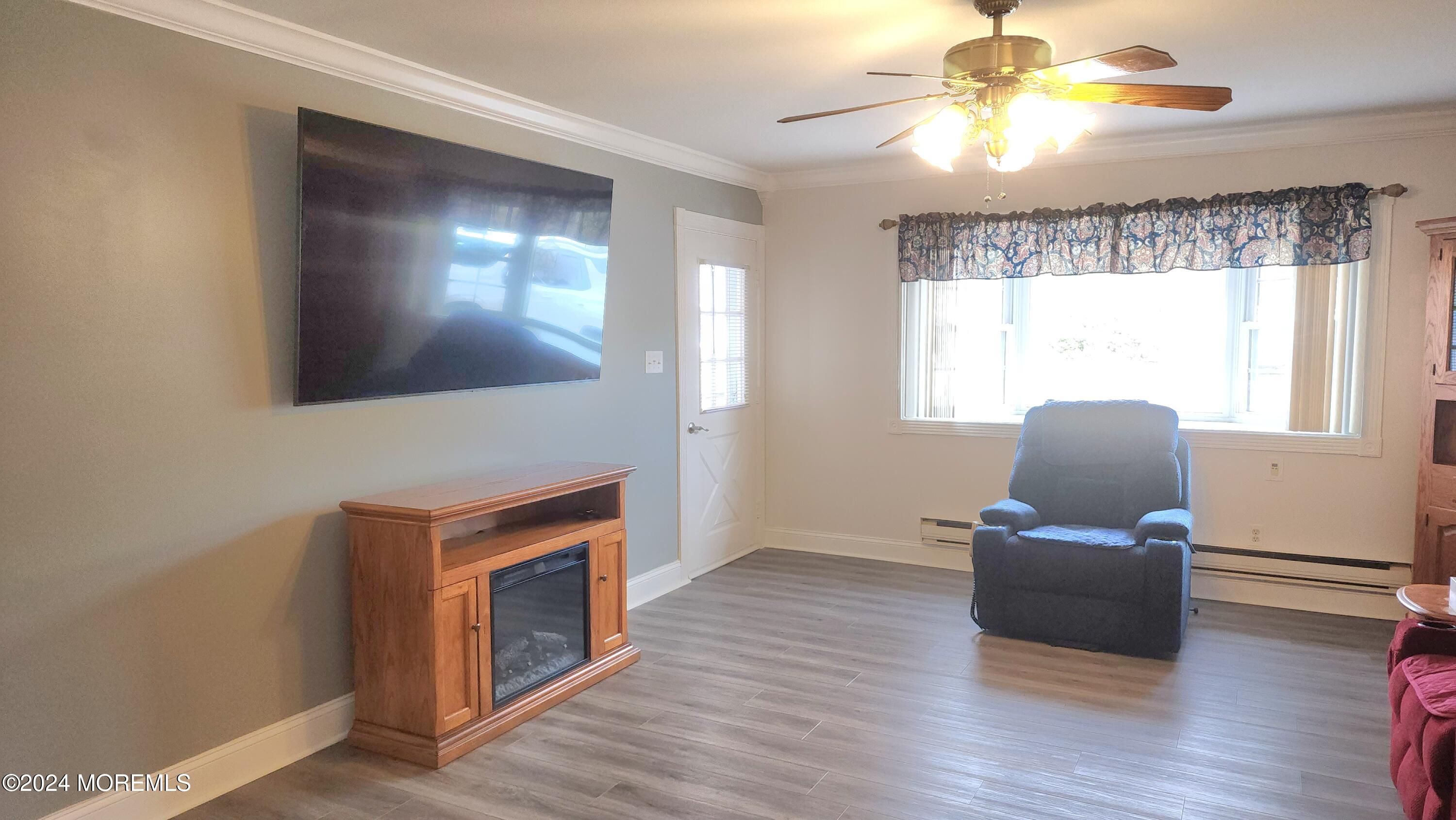 1 Ohio Drive, Unit B Whiting, NJ 08759 - Photo 11 of 37 a living room with furniture and a fireplace