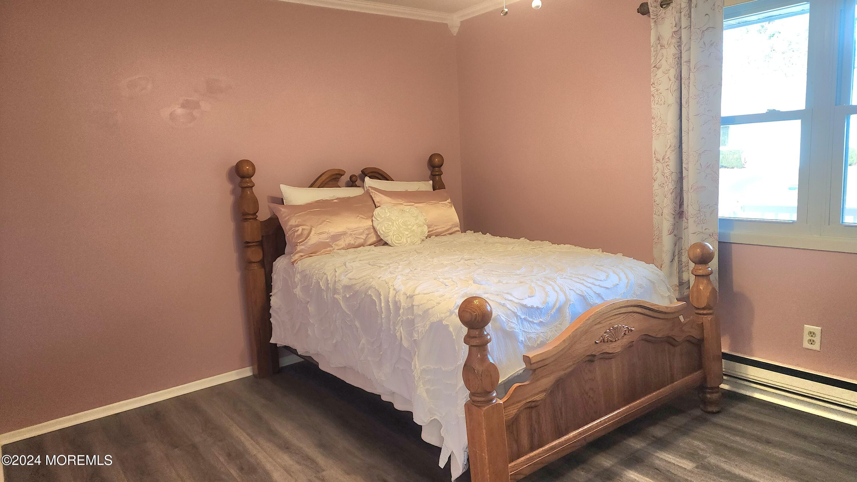 1 Ohio Drive, Unit B Whiting, NJ 08759 - Photo 23 of 37 a bedroom with a bed and a window