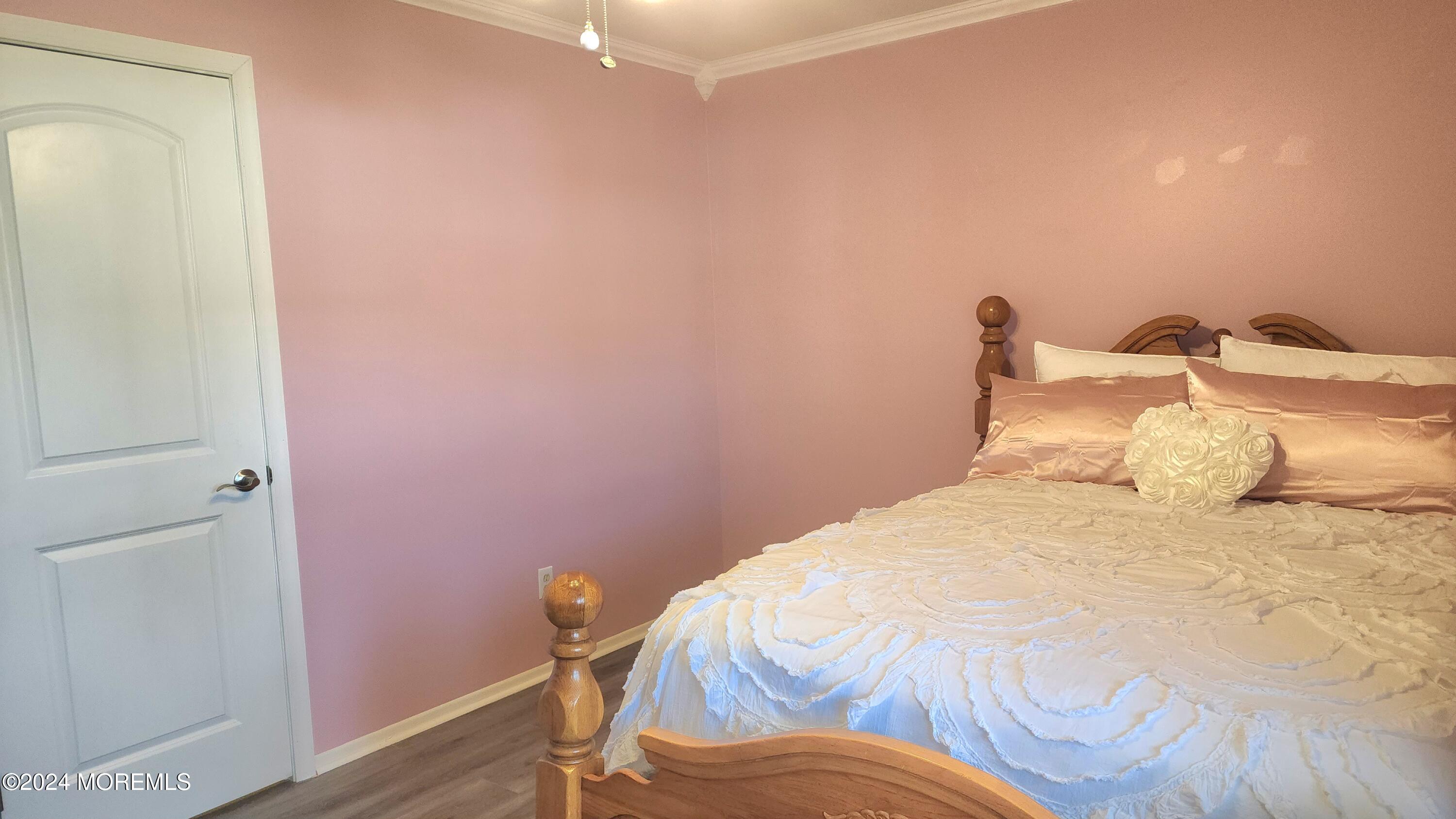1 Ohio Drive, Unit B Whiting, NJ 08759 - Photo 25 of 37 a bedroom with a bed and a table
