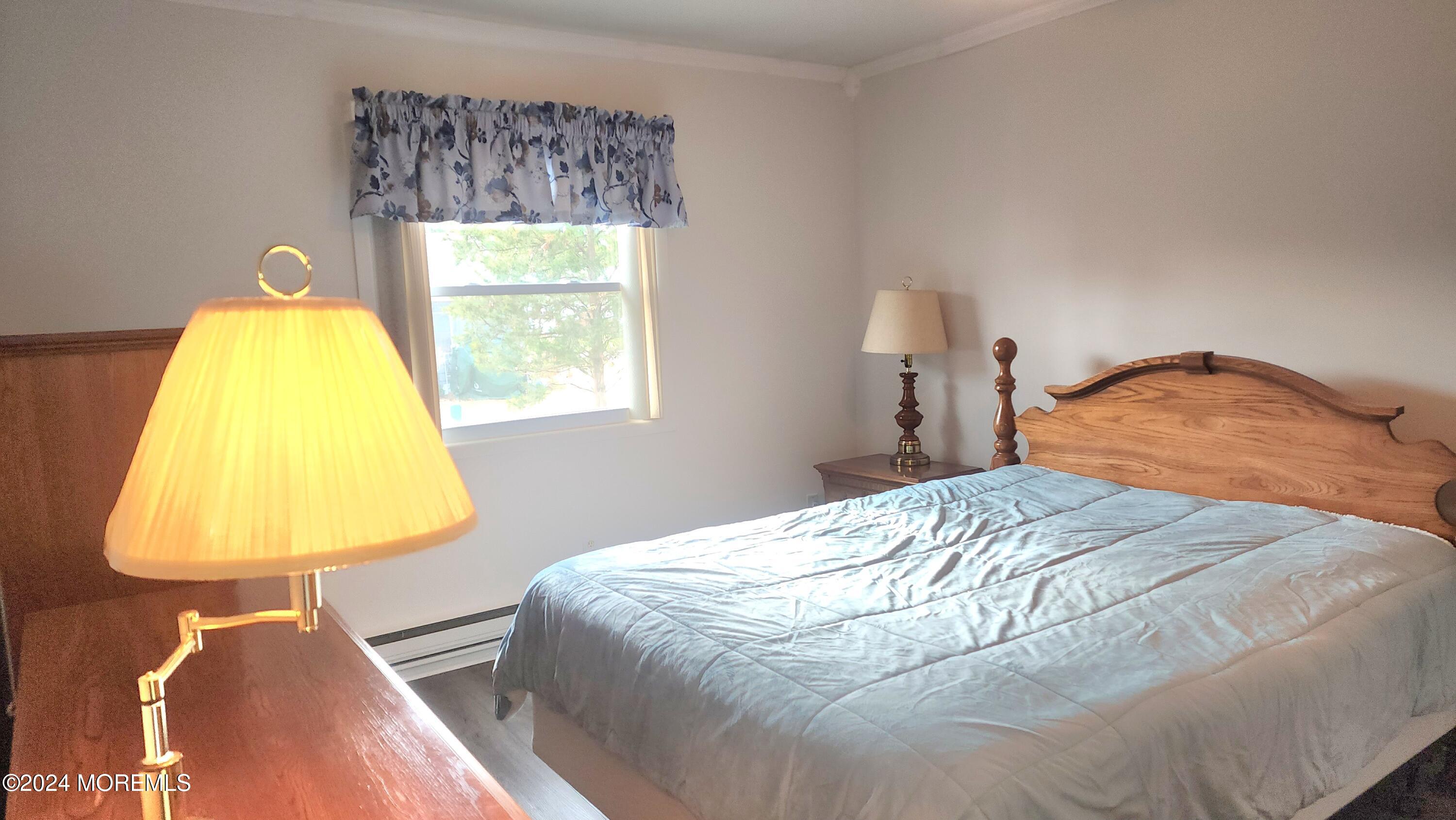 1 Ohio Drive, Unit B Whiting, NJ 08759 - Photo 31 of 37 a bedroom with a bed and a window
