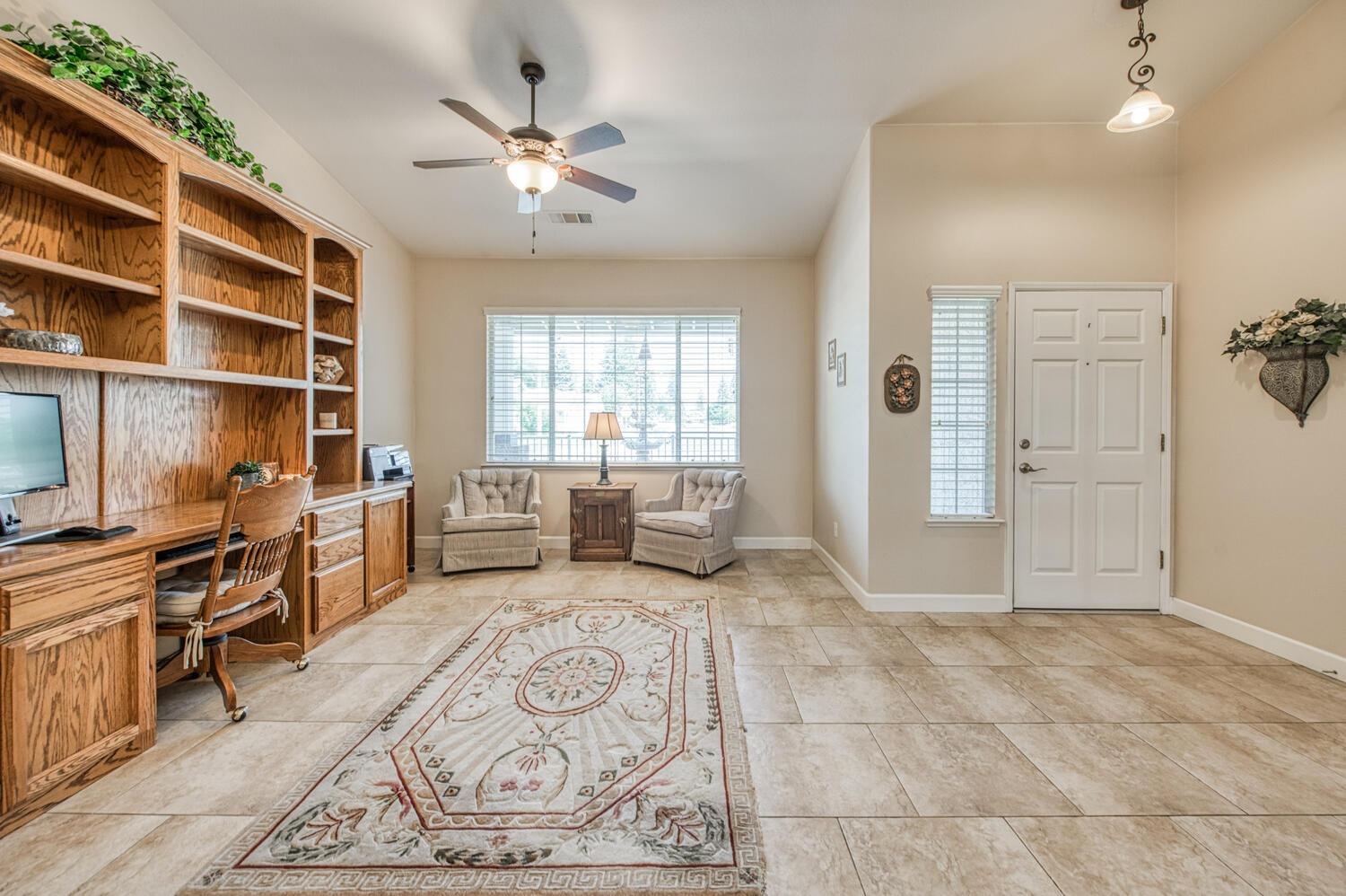 2512 Keats Avenue Clovis, CA 93611 - Photo 15 of 39 a living room with furniture and white walls