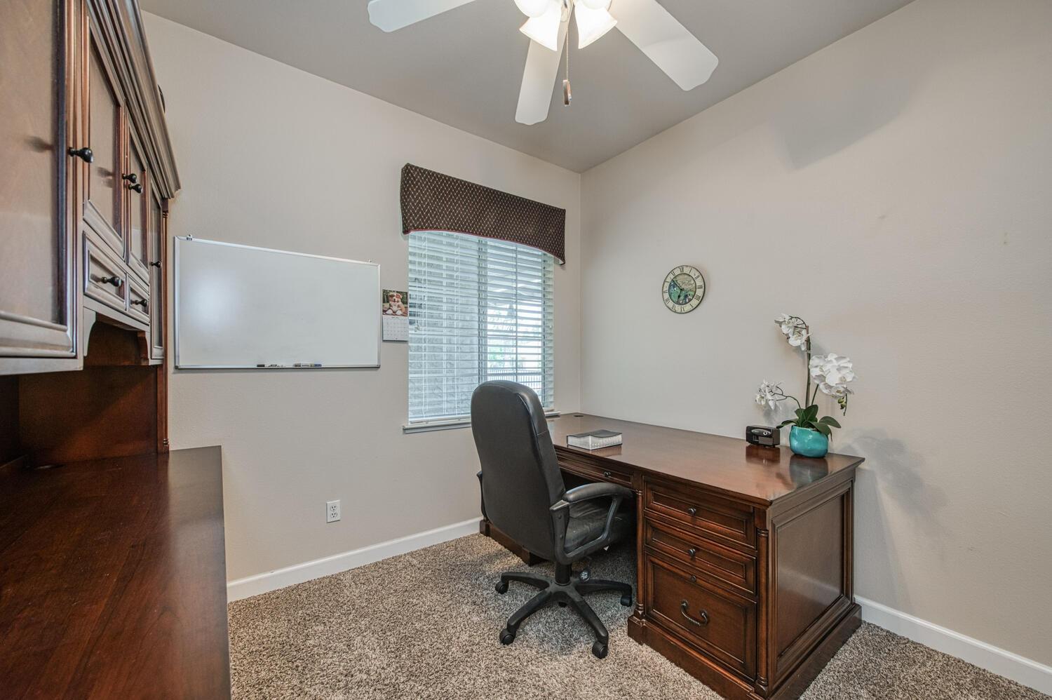 2512 Keats Avenue Clovis, CA 93611 - Photo 23 of 39 a workspace with furniture and window