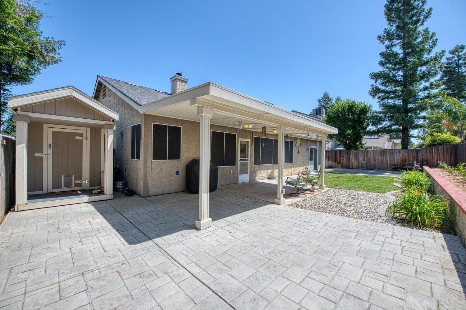 2512 Keats Avenue Clovis, CA 93611 - Photo 35 of 39 a front view of a house with yard and porch