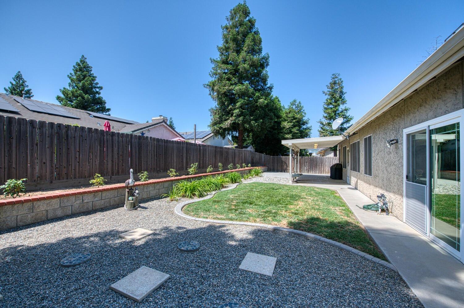 2512 Keats Avenue Clovis, CA 93611 - Photo 39 of 39 a view of a back yard of a house with a patio