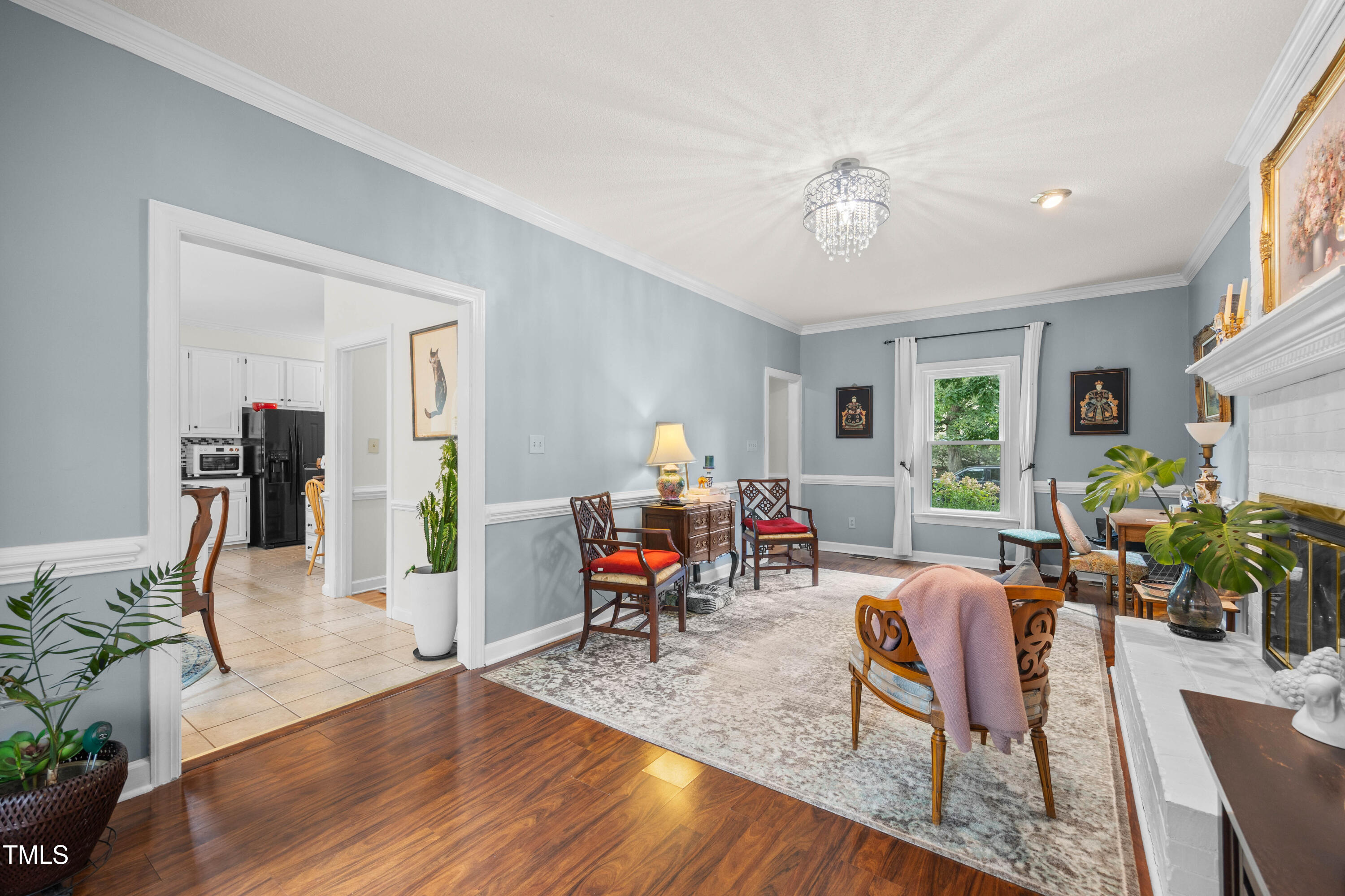 207 Wintermist Drive Cary, NC 27513 - Photo 14 of 43 a living room with furniture and wooden floor