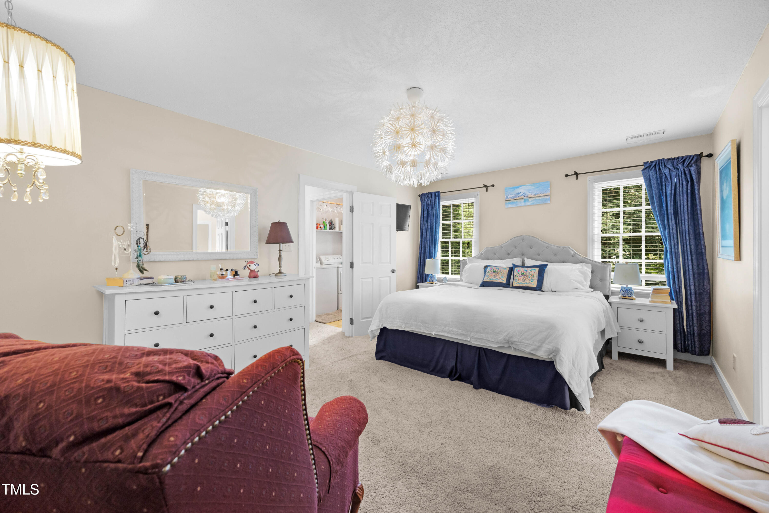 207 Wintermist Drive Cary, NC 27513 - Photo 24 of 43 a bedroom with a bed and window