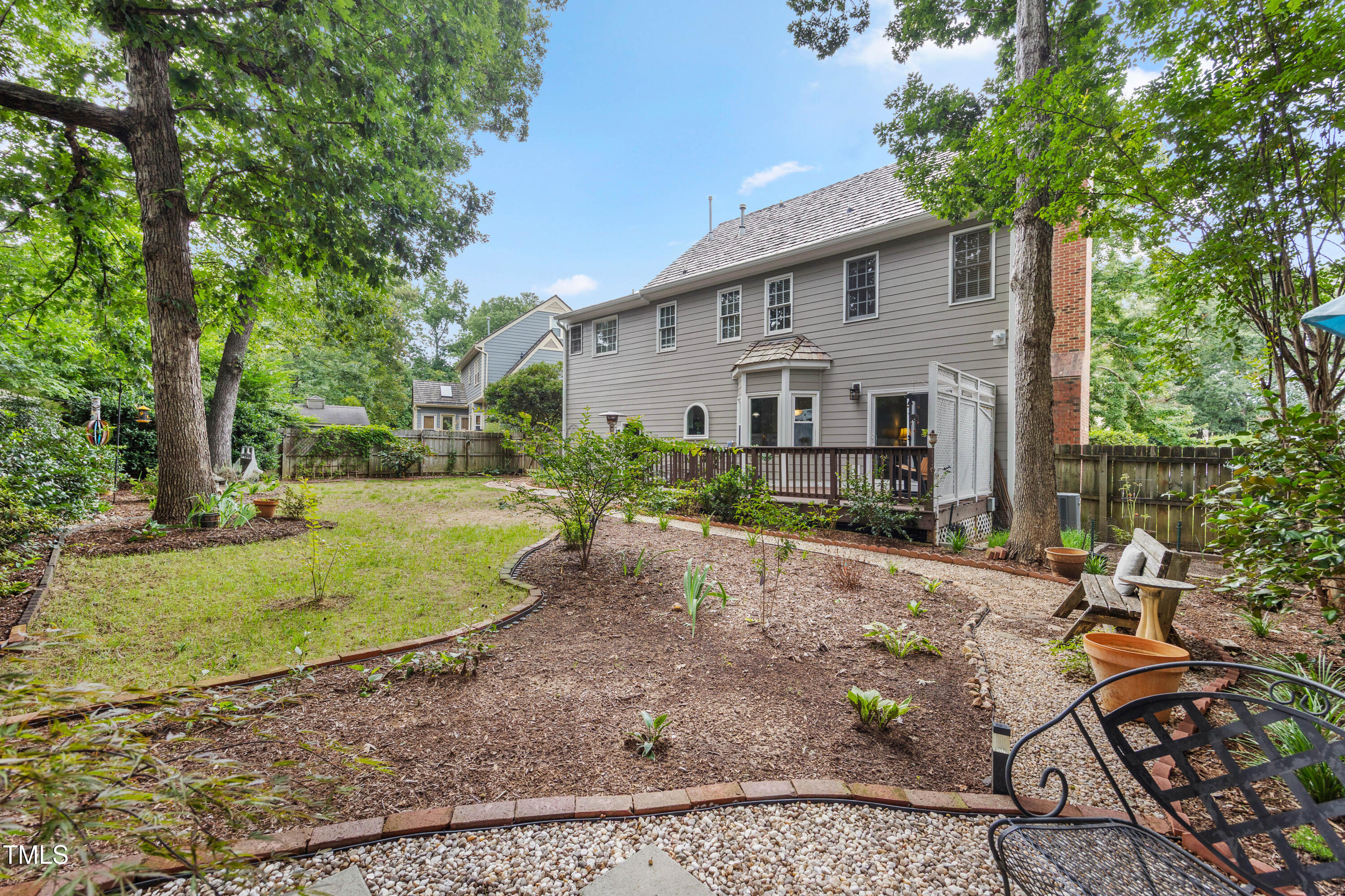 207 Wintermist Drive Cary, NC 27513 - Photo 36 of 43 a view of a house with backyard