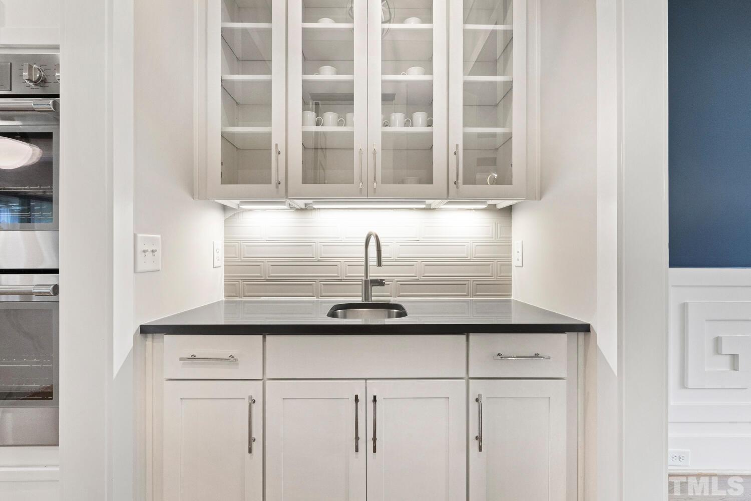 5105 Bella Ridge Drive Raleigh, NC 27615 - Photo 11 of 60 a sink with a window