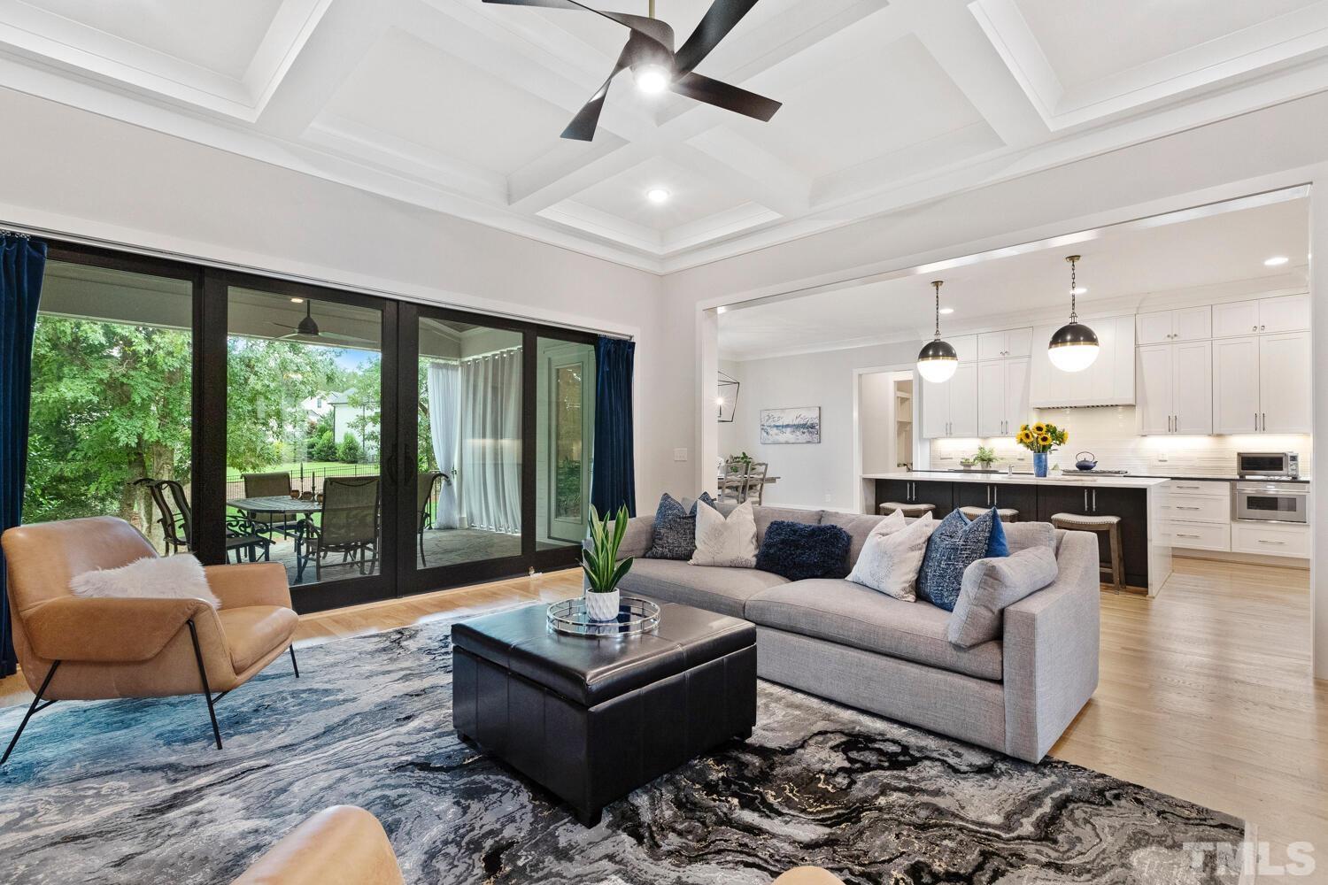 5105 Bella Ridge Drive Raleigh, NC 27615 - Photo 21 of 60 a living room with furniture and a large window