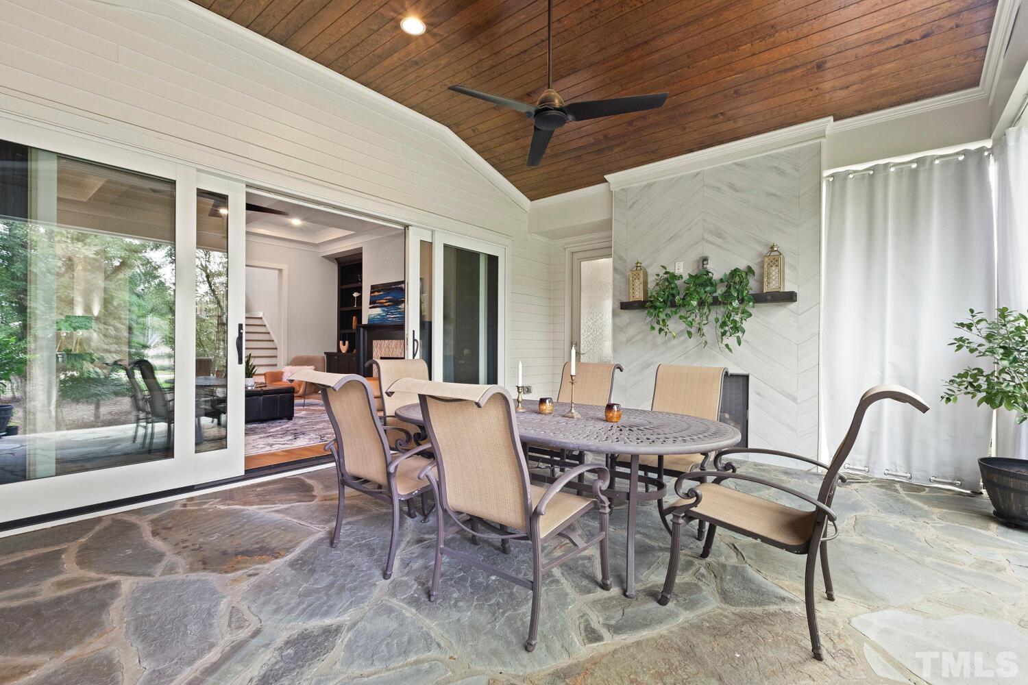 5105 Bella Ridge Drive Raleigh, NC 27615 - Photo 25 of 60 a view of a dining room with furniture window and outside view