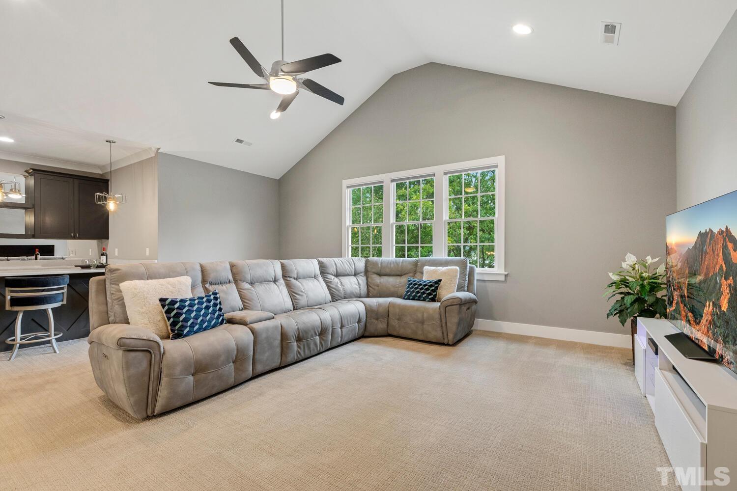 5105 Bella Ridge Drive Raleigh, NC 27615 - Photo 43 of 60 a living room with furniture and a large window