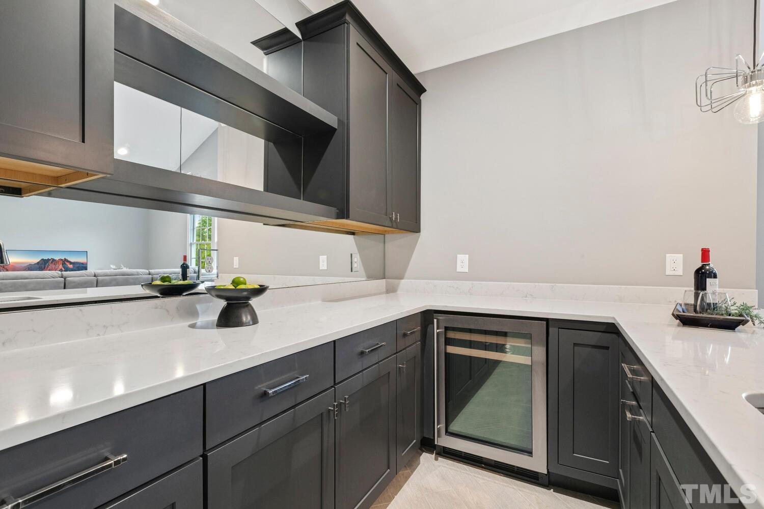 5105 Bella Ridge Drive Raleigh, NC 27615 - Photo 45 of 60 a kitchen with a sink and cabinets