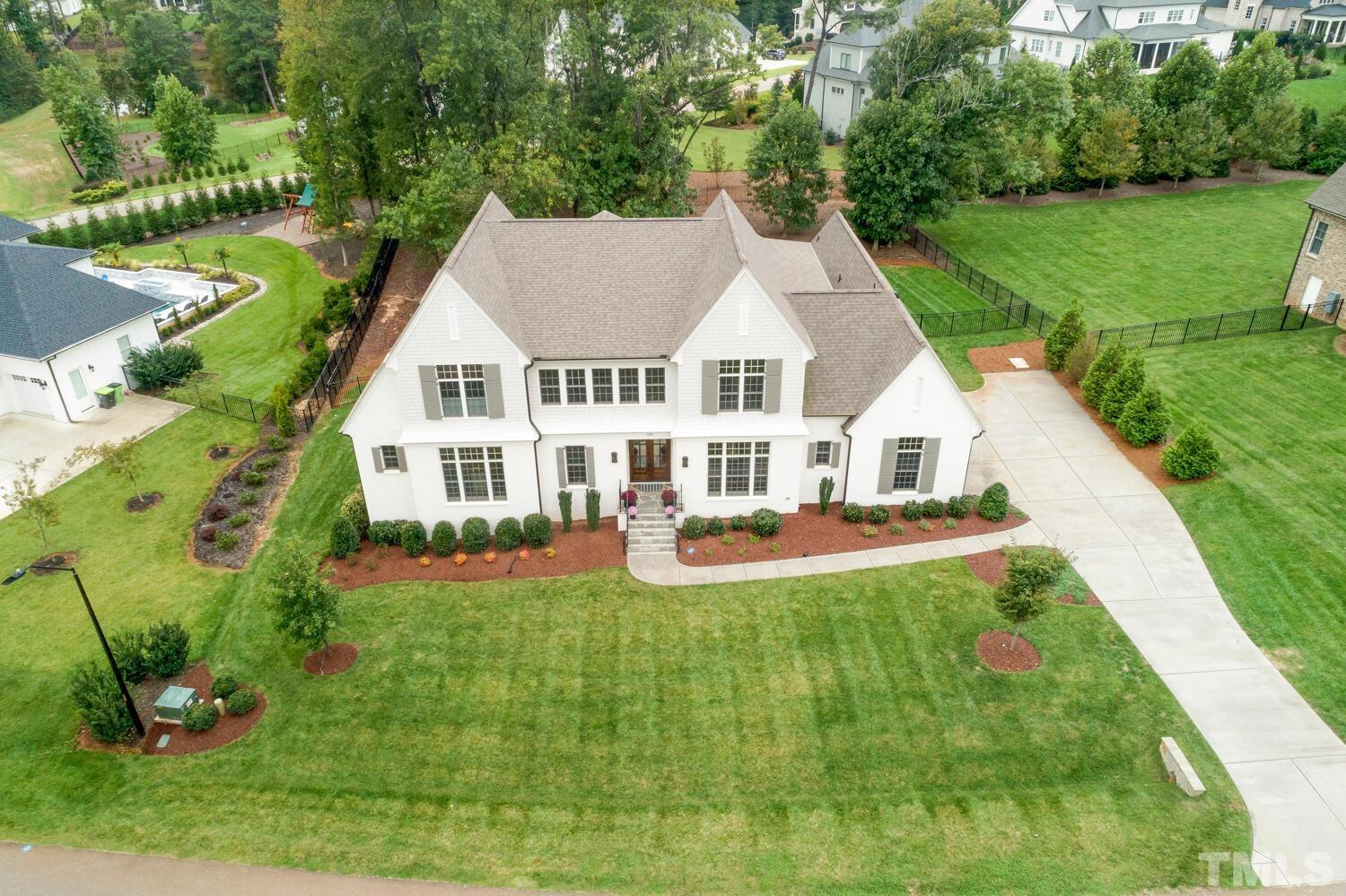 5105 Bella Ridge Drive Raleigh, NC 27615 - Photo 51 of 60 a view of a house with a yard and sitting area