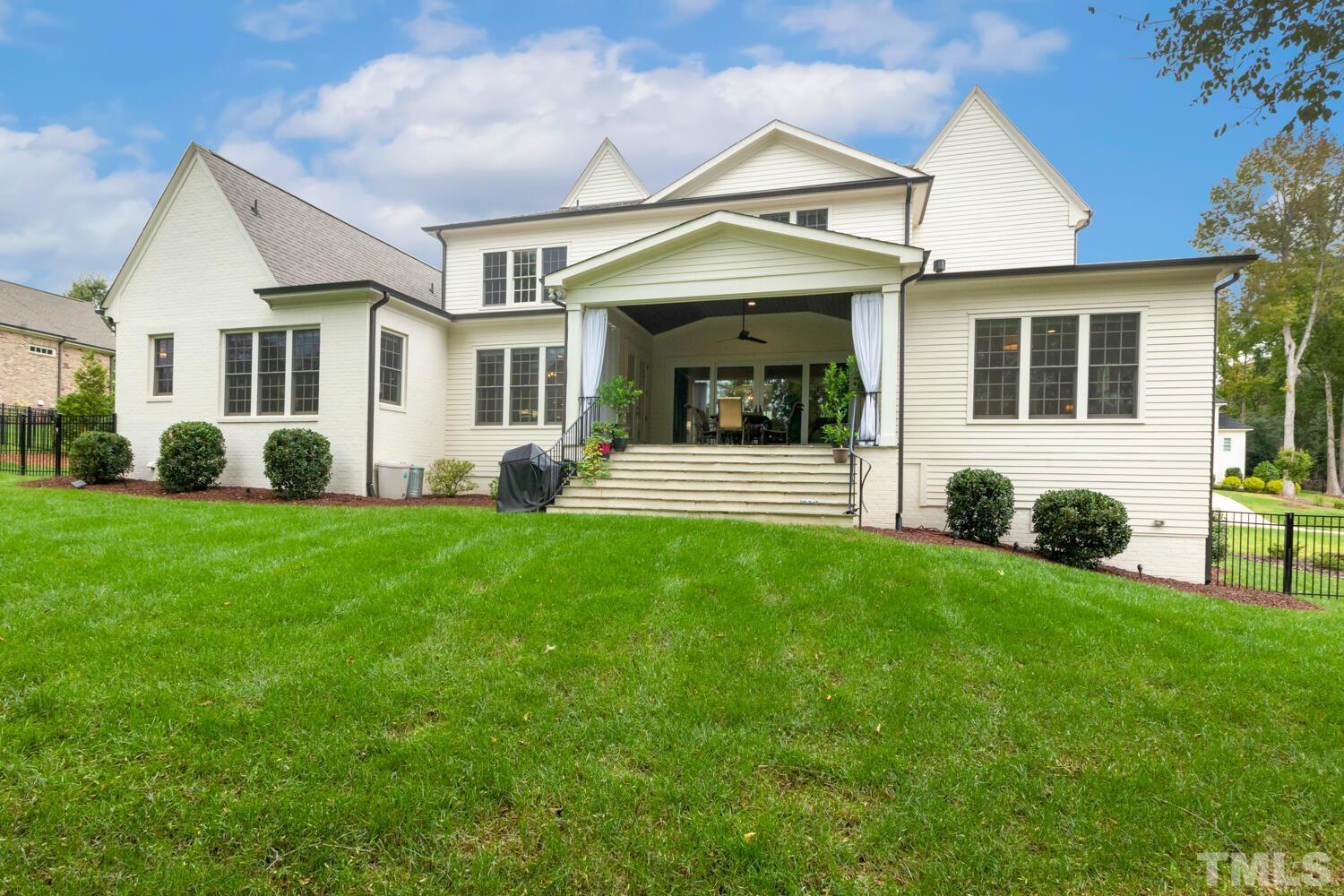 5105 Bella Ridge Drive Raleigh, NC 27615 - Photo 53 of 60 a front view of a house with a yard