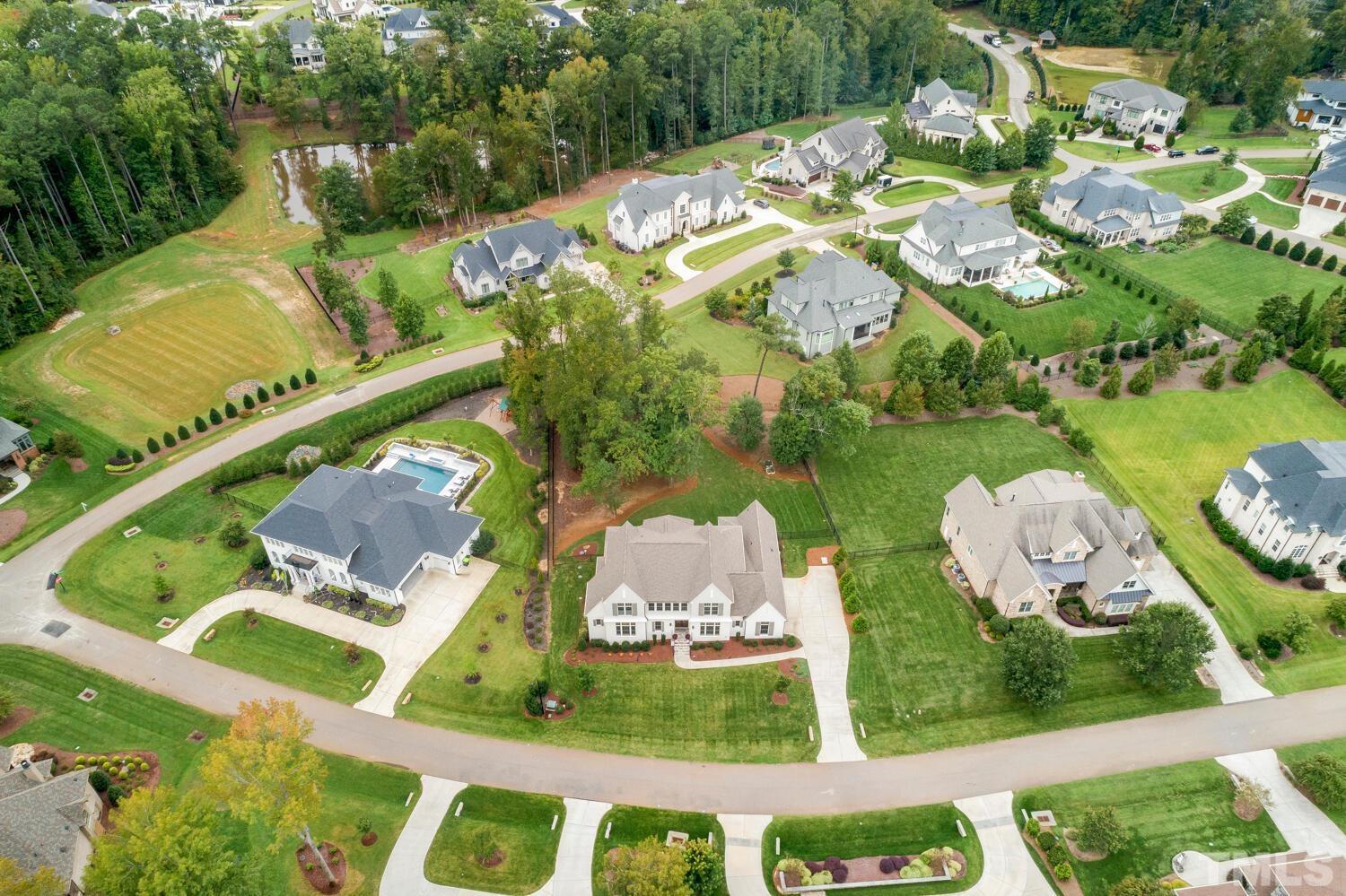 5105 Bella Ridge Drive Raleigh, NC 27615 - Photo 55 of 60 an aerial view of a house having outdoor space