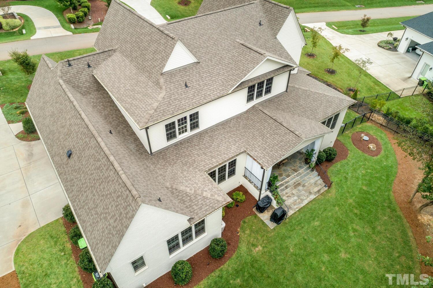 5105 Bella Ridge Drive Raleigh, NC 27615 - Photo 58 of 60 an aerial view of a house with swimming pool and patio