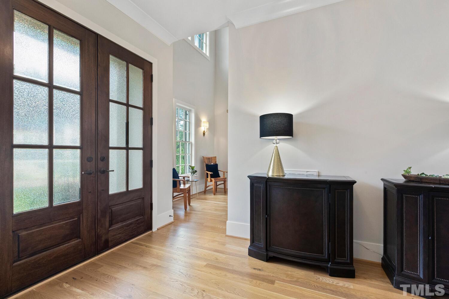 5105 Bella Ridge Drive Raleigh, NC 27615 - Photo 6 of 60 wooden floor in an empty room with a window