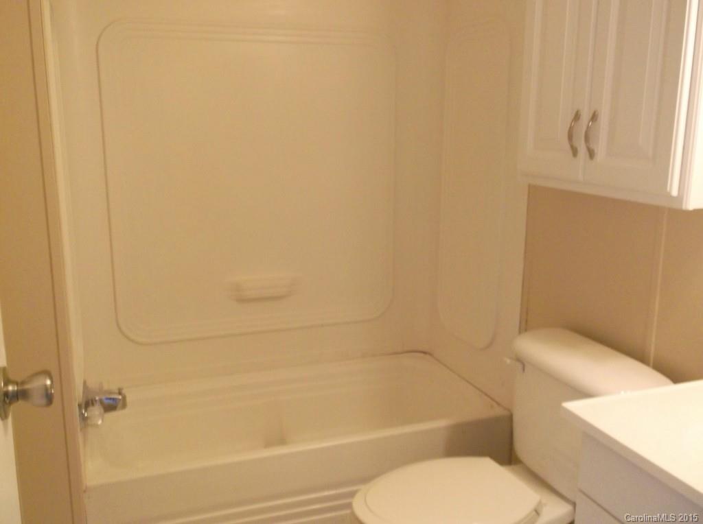 1264 Raxter Road Edgemoor, SC 29712 - Photo 18 of 21 a bathroom with a toilet and a bath tub