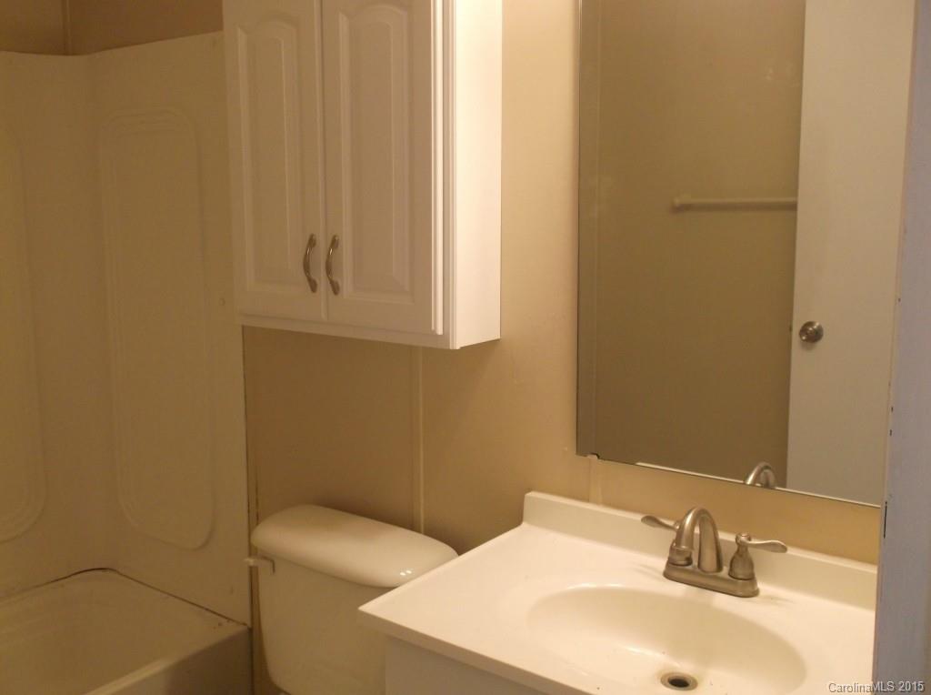 1264 Raxter Road Edgemoor, SC 29712 - Photo 19 of 21 a bathroom with a sink and a mirror