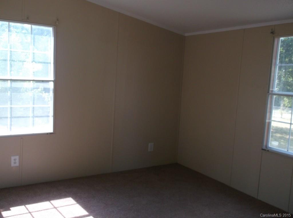 1264 Raxter Road Edgemoor, SC 29712 - Photo 20 of 21 an empty room with a window
